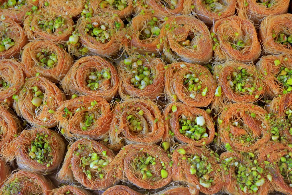 baklava on display at a market in jordan